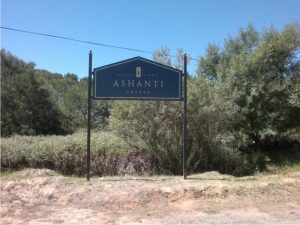 Planted Metal Sign